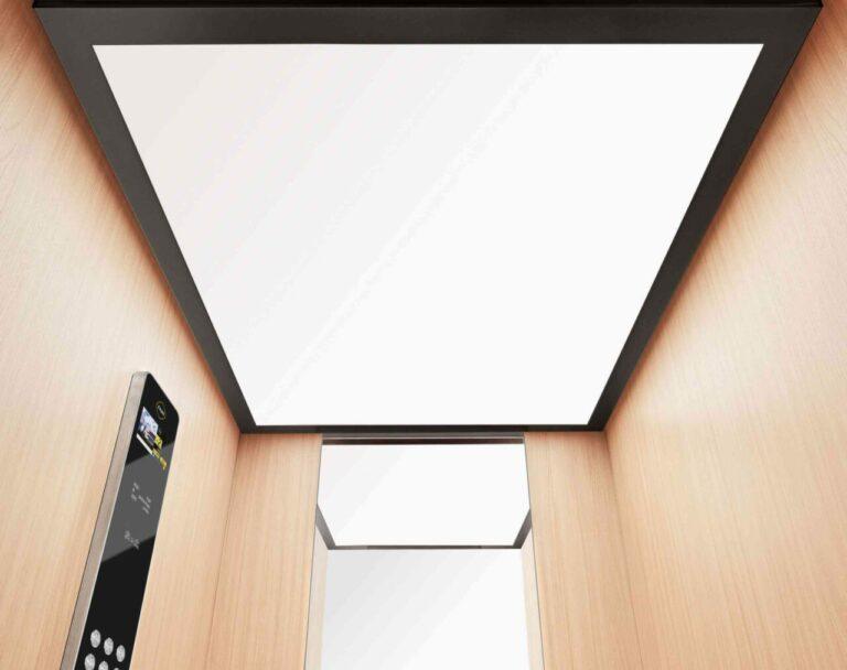 Techo interior cabina ascensor recubrimiento madera FAIN